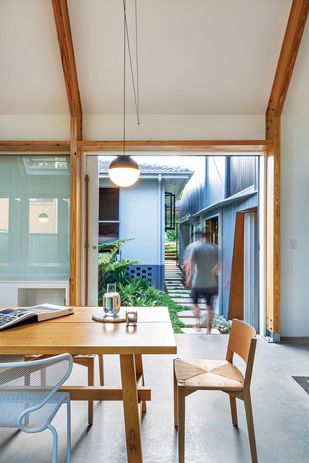 The Brisbane home’s breezeways, established during the renovation, have become a pleasant daily walking circuit for Chloe’s father, who is living with dementia.