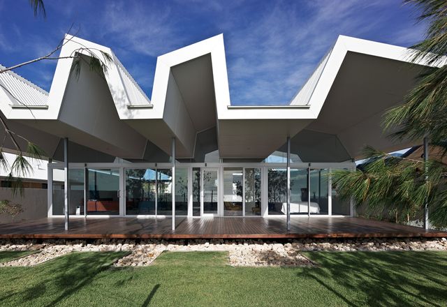 A dramatic roof form is the main feature of IPH’s Florida Beach House.