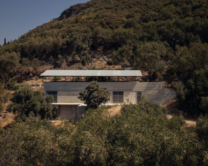 House in an Olive Grove (2024) by Invisible Studio offers a contemporary interpretation of vernacular architecture of Corfu, Greece.
