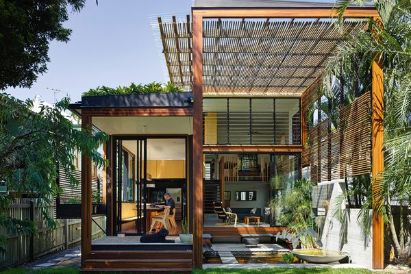 A giant timber screen portal provides privacy from neighbours while creating “a splendid moment of opening and embrace.”