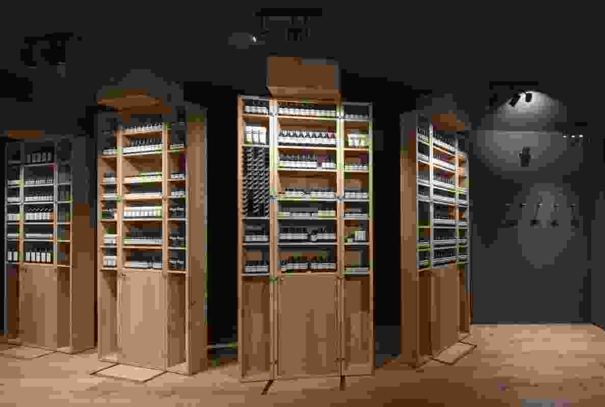 The cabinets containing Aesop's products lead the visitor through the space.