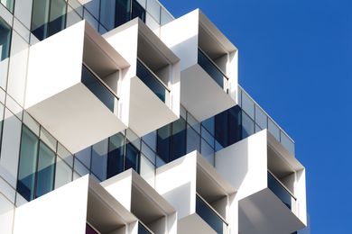 The projecting balconies of the Upper House by Jackson Clements Burrows add dynamism and depth to the building envelope.