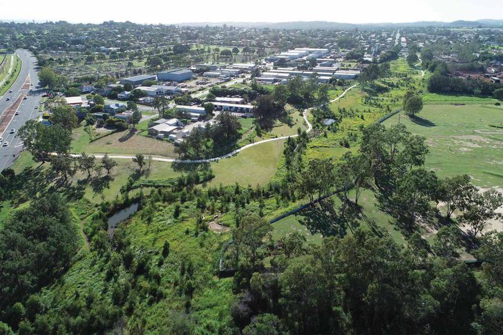 Near Ipswich, a regeneration project by Landscapology and Bligh Tanner has transformed Small Creek from a concrete channel into a living waterway with path and bikeway connections.