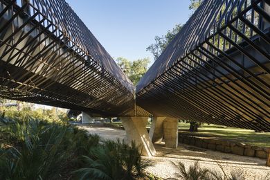 Tanderrum Bridge designed by John Wardle Architects and NADAAA begins in Birrarung Marr's lower terrace.