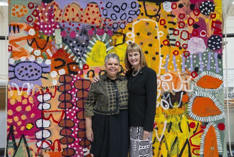 ATW Director Antonia Syme AM (right) and Deborah Cheetham AO with ‘The Royal Harvest’, 2021, by Naomi Hobson.