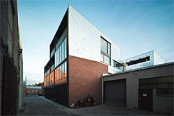  The eastern elevation reveals the two-volume massing, with space between the volumes allowing air and light into the centre of the site. Image: Peter Bennetts. 