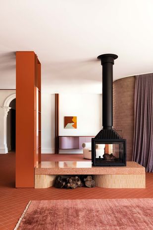 A sculptural fireplace is the heart of Hermon, an ambitious 