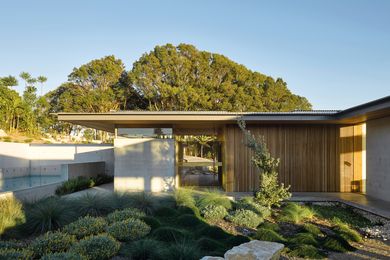 Designed for a spectacular sloping site in Queensland, Coolamon House sits “gently on the land.”