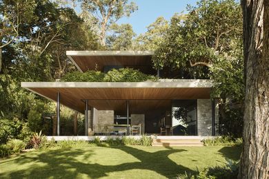 M House by Rama Architects takes shape as a commanding and imposing brutalist form that is softened and subdued by the purposeful act of being embedded within the surrounding landscape.