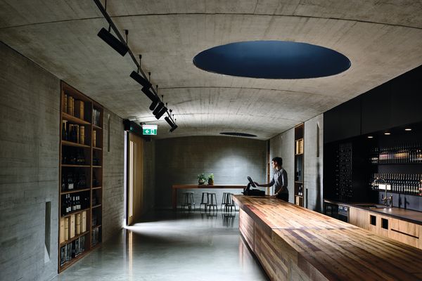 The cellar door is a shallowly vaulted linear space with a flexible plan, allowing it to serve as a wine- and produce-tasting retail space, a long banquet room and everything in between.