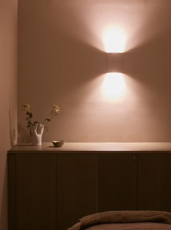 Applied to the walls and scones, Dulux's 'Warm Day' creates a cosy atmosphere in the treatment rooms.