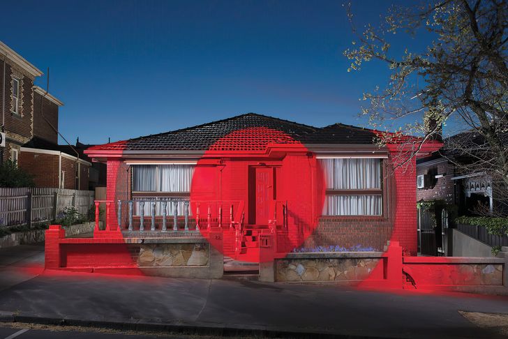 A red target painted by artist Ian Strange on Maria’s old home marks it out for demolition, conjuring a deep melancholy but also reflecting a new future.