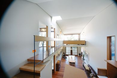 Although the house is small in footprint, the double-height space and connection between levels make it feel larger.