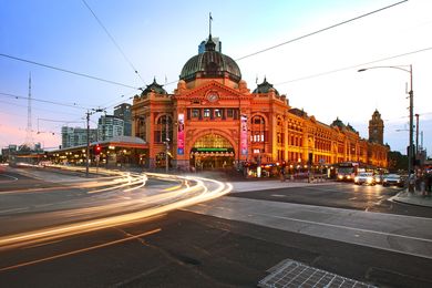 Flinders St Station at dusk.