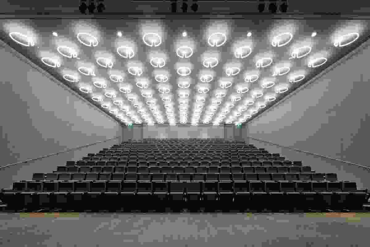 The lecture theatre’s fluorescent lights demonstrate the power of light.