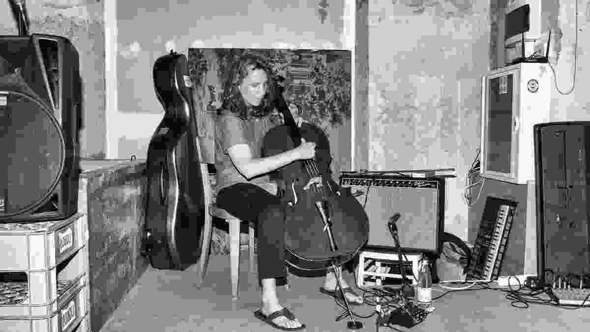 Seattle cellist Lori Goldston, playing at the Seidler Penthouse. 