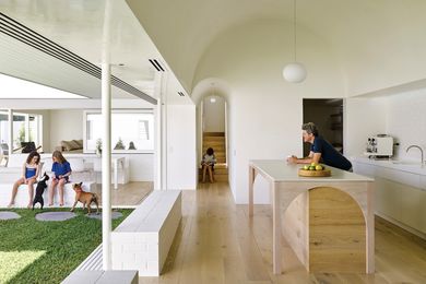 The motif of the barrel vault is carried through the house, with a dramatic, geometric ceiling highlighting the importance of the kitchen.