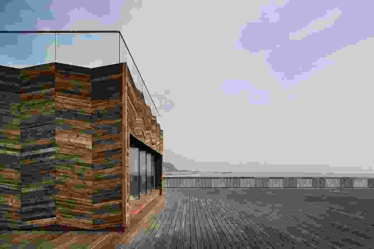 The new visitor centre of Hastings Pier by DRMM is a CLT structure clad in recycled timber.