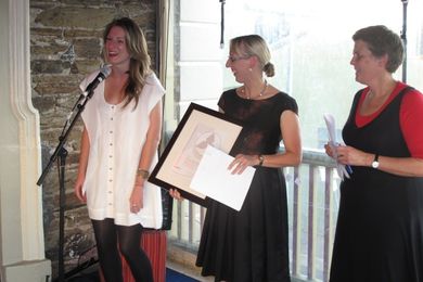 Susie Quinton receiving the award from the mayor of Charles Sturt, Kirsten Alexander, and the president of AILA SA, Tanya Court.