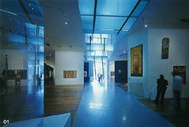 Looking south down the ground floor Indigenous Art gallery, with the bridges over the south intrafilament above. Image: Trevor Mein.