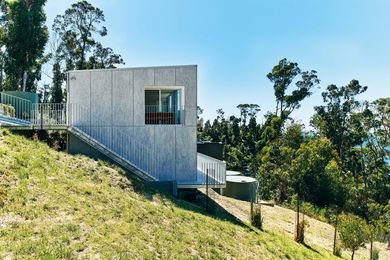 Externally, the house is clad in non-combustible cement sheet and steel balustrades.