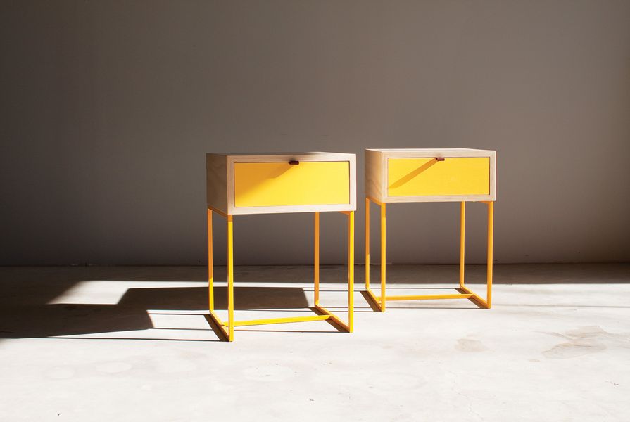 Pure forms and strong colours typify the work of Maker Studio, as seen in these yellow Scout side tables.
