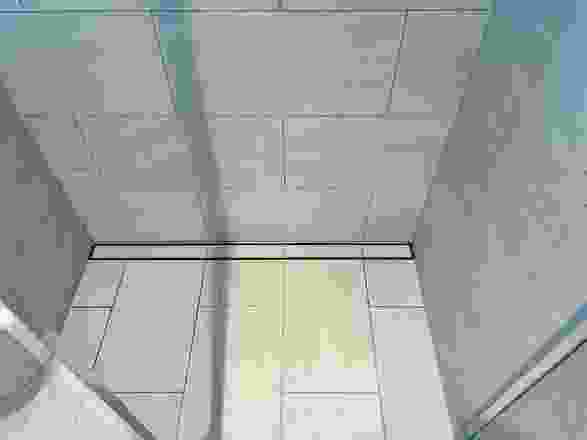 Wall-to-wall shower channels specified for Victoria & Vine