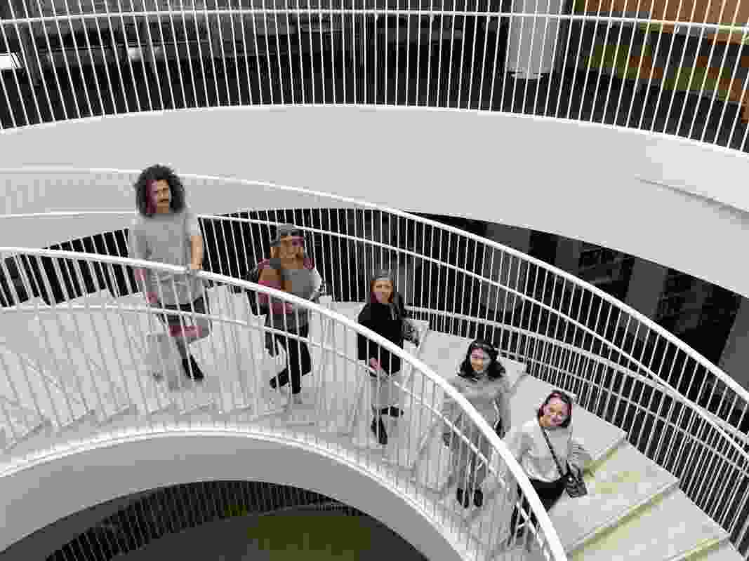 The 2023 Dulux Study Tour winners at University of Helsinki Library by Anttinen Oiva Architects. L–R: Bradley Kerr, Sarah Lebner, Ellen Buttrose, Tiffany Liew and Edwina Brisbane.