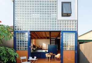 Charismatic new architecture brings the kitchen to ground level and introduces a neat mezzanine.