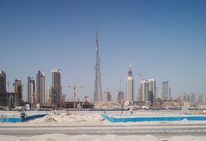 Highrise construction in Dubai, UAE, where much of the architecture is designed from afar, with little connection to the nuances of place. Juhani Pallasmaa describes it as “almost irresponsible to design buildings in alien cultures.”