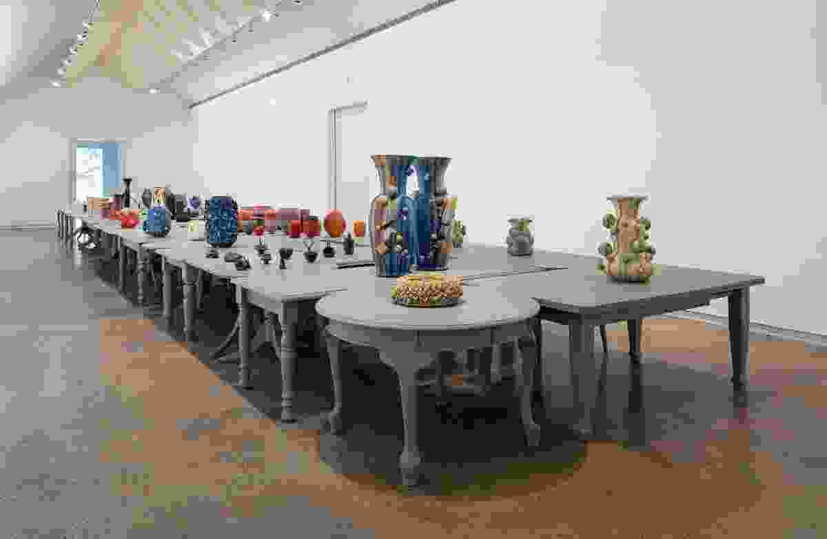 In the main gallery, the vessels are displayed on a surface composed of forty-five tables designed by John Wardle Architects.