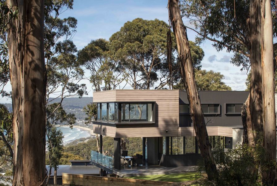 DecoClad V-groove aluminium cladding featured on house in Lorne, Victoria, finished in Decowood weathered timber.