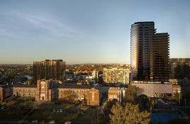 661 Chapel Street rising above the South Yarra landscape.