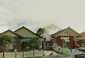 Speculative street view of Established Manors in Canterbury, Sydney. Each existing house is split down its central hallway to create an additional dwelling. In lieu of an ensuite pod and garage between the existing houses, an entrance and kitchen trigger the new dwelling.