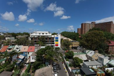 Studios 54 is situated on a remnant site within an urban context, with an existing apartment building to its north and a laneway to its south.