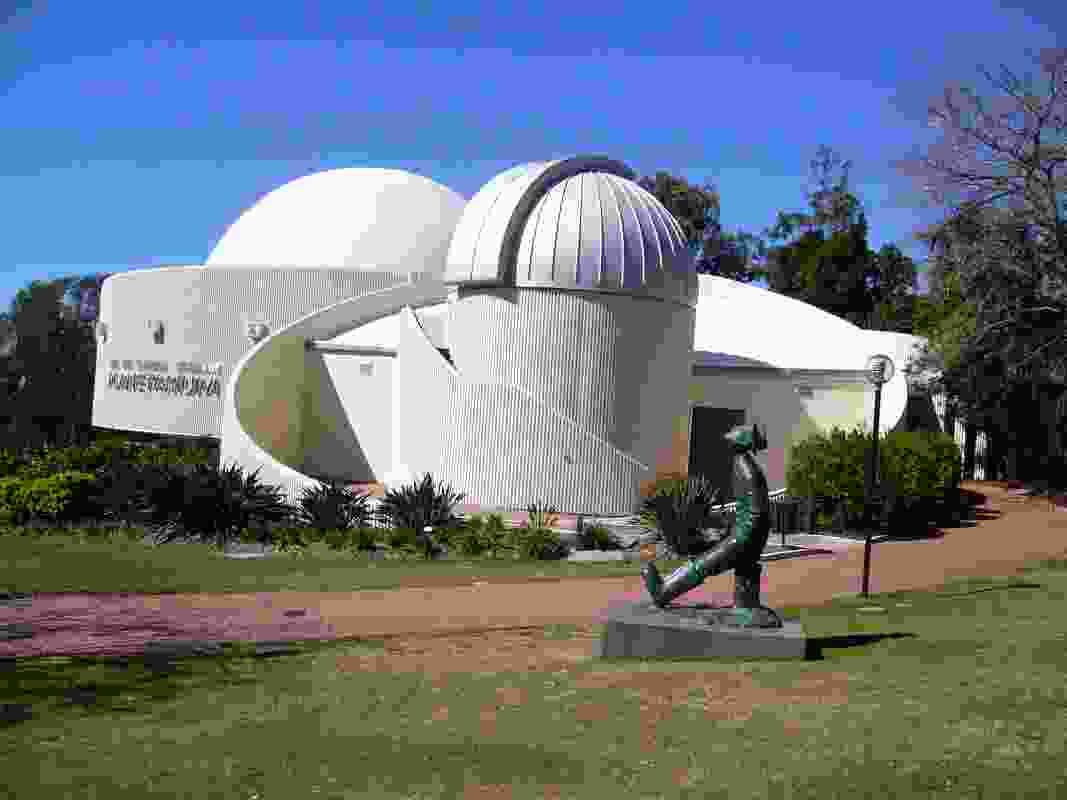 A statue of Konstantin Eduardovich Tsiolkovsky, the Russian and Soviet rocket scientist, outside of the Sir Thomas Brisbane Planetarium