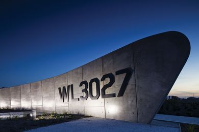 The entrance sign to Williams Landing replicates a large riveted aileron jutting out of the ground, referencing the site’s aeronautical history.