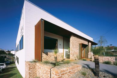 The 1960s concrete blockwork building is a standalone edifice.