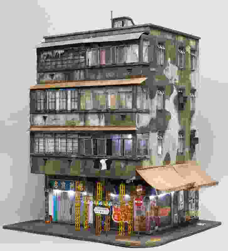 23 Temple Street is based on a building in Kowloon, Hong Kong, and is made from cardboard, MDF, plastic card, spray paint and wire.
