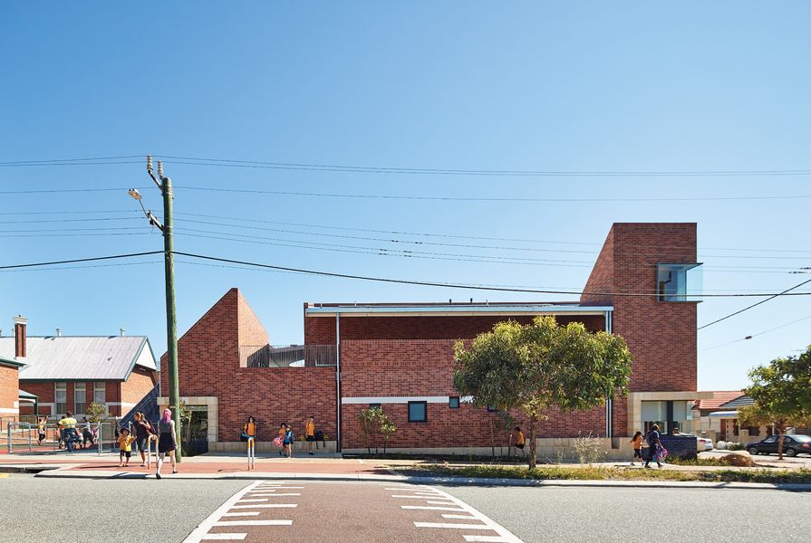 Conscious of Perth’s geological bed, the designers sat the new building on a limestone plinth at the site boundary, obviating the need for a fence and incidentally creating a platform on which children can perch.