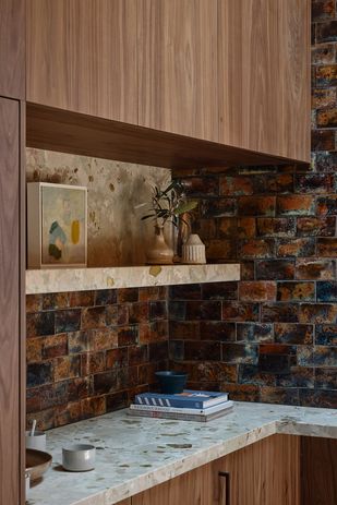 The original handmade Daniel Robertson tiles were salvaged from the existing kitchen as well as elsewhere in the home.