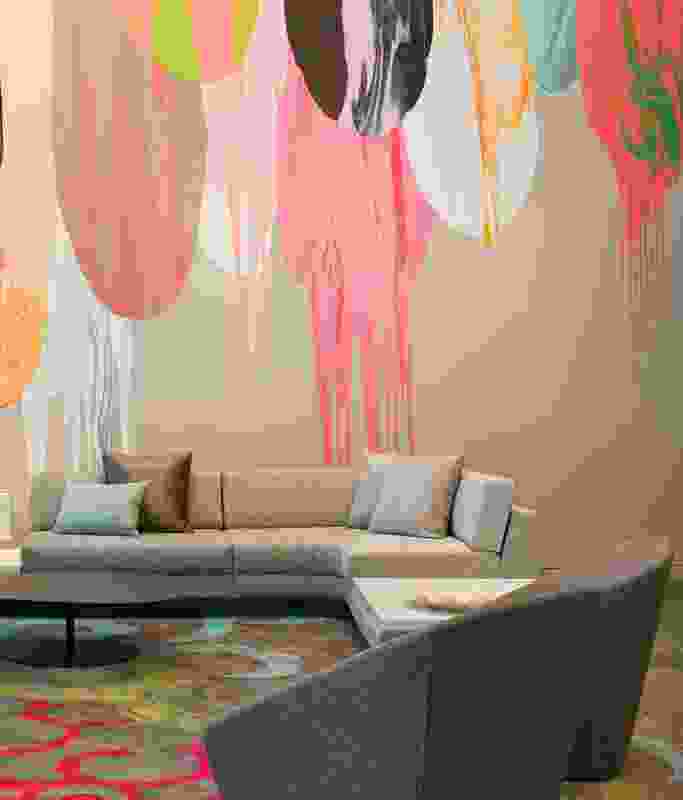 Group lobby with wall mural by Melbourne artist Noël Skrzypczak.