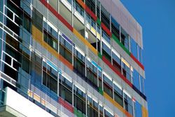 Facade detail. The colourful facade is designed to reflect the diversity within.