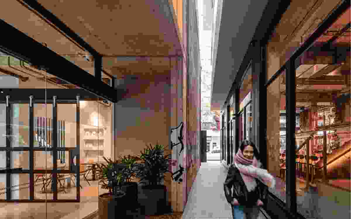 A laneway has been inserted into the ground-floor plan, providing a second facade to the retail space and allowing the public to cut through to the rear lane.