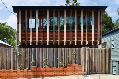 The home’s expressed joists give insight into its tectonics and create a striking facade that facilitates engagement with the street.