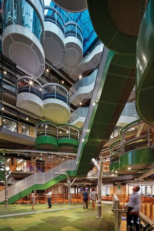 The cheerful and appealing interior focuses on the Pilot Hall, a large, multi-level underground test facility.