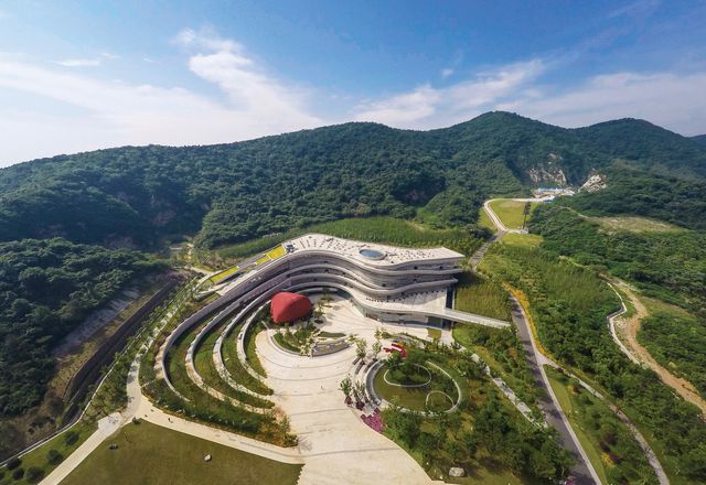 The museum building, designed by architects Studio Odile Decq, is nestled into the contours of the heavily quarried hillside.