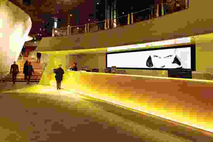The new lobby adopts a glowing, yellow interior.