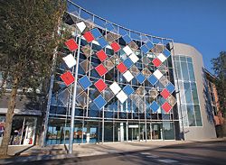 Whitten Oval, redevelopment by Peddle Thorp – a tensile net of lightweight panels and cables provides a transparent facade. Photograph Jesse Spezza.