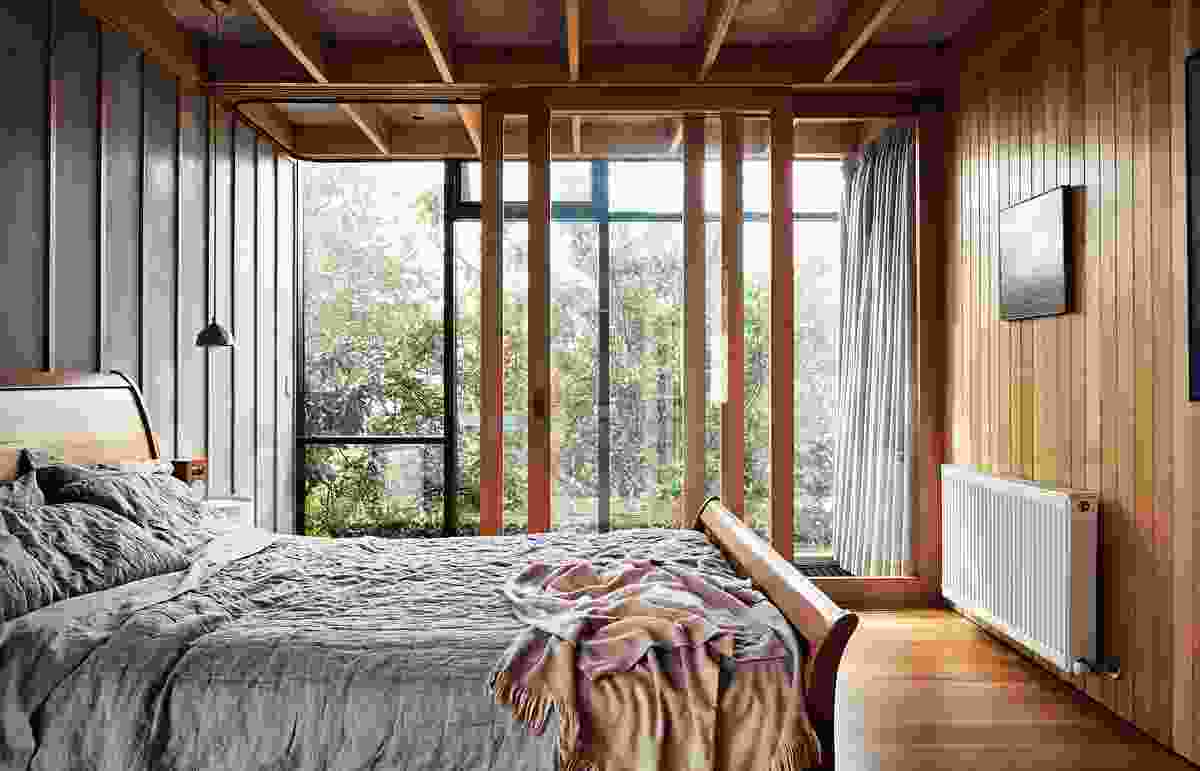A pair of mature fig trees shroud the upstairs bedroom, creating a private sanctuary. Artwork: Greg Wood.